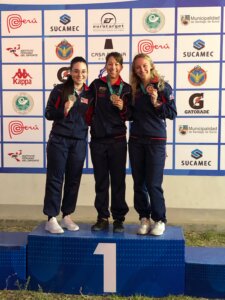 L to R, Mary Tucker, second place, Sagen Maddalena, first place, and Ali Weisz, third place, with their medals for Women’s Air Rifle at the CAT Championship in Lima, Peru, Nov. 8.