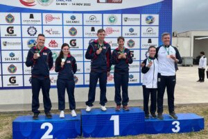 Tim Sherry and Mary Tucker with their silver medals and Patrick Sunderman and Sagen Maddalena with their gold medals for Mixed Team 50m Prone Rifle.