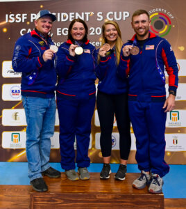 L to R, Derrick Mein, Caitlin Connor, Sam Simonton, and Vincent Hancock standing on the podium with the medals they earned at the 2022 ISSF President’s Cup in Cairo, Egypt, Nov. 28- Dec. 4